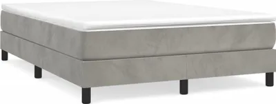 A bed frame with a mattress on top, shown from a side angle against a white background.