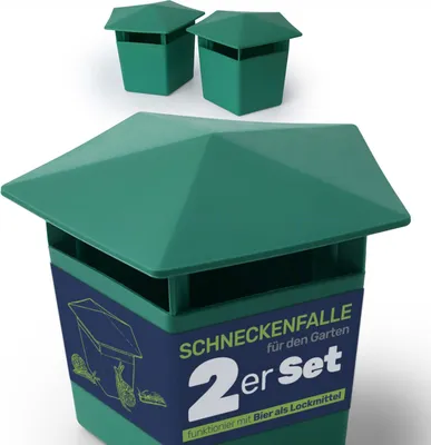 Two green snail traps with a label on the front of one.