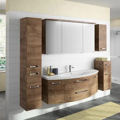 A modern bathroom vanity with a tall cabinet, a sink, and a medicine cabinet.