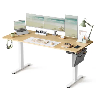 A modern standing desk setup with multiple monitors, a laptop, and accessories.