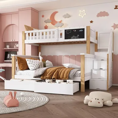 A child's bedroom with a bunk bed, desk, and toys.