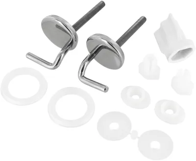 A collection of toilet seat hinges and mounting hardware, including metal hinges, plastic washers, and mounting brackets, laid out on a white background.