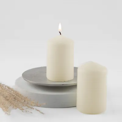Produktbild von Stumpenkerzen-Set, 50 x 80 mm - Elfenbein, Creme, Champagner | Besonders lange Brenndauer, ca. 18 Stunden | Kleine Stumpenkerzen | Set bestehend aus 2 Kerzen