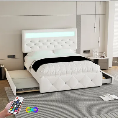 A white upholstered bed with a tufted headboard and LED lighting, featuring a pull-out trundle bed and drawers.