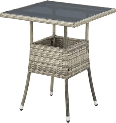 A square outdoor table made of polyrattan with a glass top and a storage compartment in the middle.