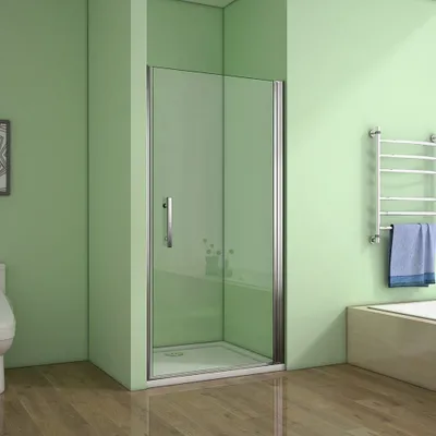 A modern bathroom with a glass shower enclosure, a toilet, and a towel rack.