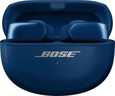 A pair of blue Bose wireless earbuds in their charging case.