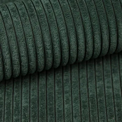 Close-up of green corduroy fabric.