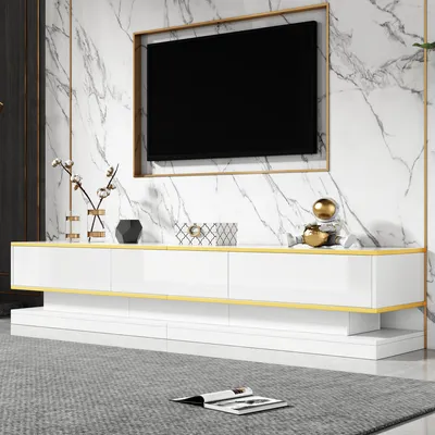 Image de okwish Meuble TV / lowboard laqué avec bord doré et grand rangement – blanc