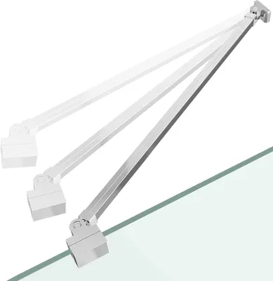 A metallic shower support arm is shown in multiple positions against a white background, with the bottom resting on a glass surface.