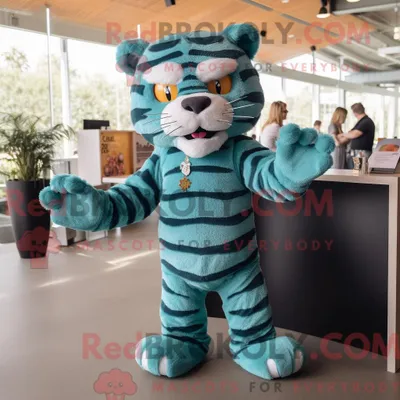 Produktbild von Teal REDBROKOLY Tiger Maskottchen Kostüm Figur bekleidet mit einem Henley-T-Shirt und Haarnadeln