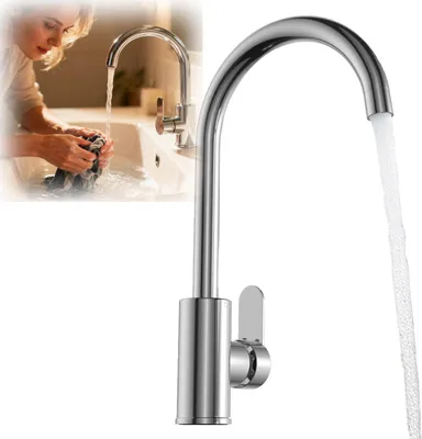 A woman is washing clothes in a sink with a faucet running.