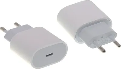 Two white Apple USB-C power adapters are shown against a white background.