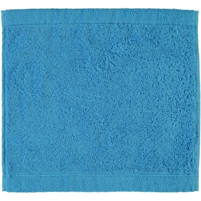 A close-up, flat lay image of a blue towel.