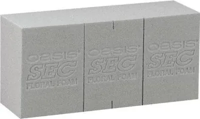 Produktbild von OASIS® Steckmasse Ziegel Dejan mit Schneidelinien, grau, 23x11x7,5cm - Kunstblumen Steckmoos