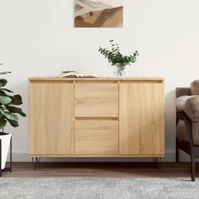 A wooden sideboard with two doors and two drawers, placed on a rug in a room.