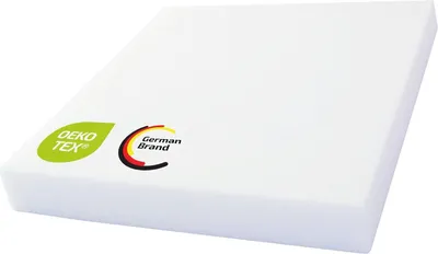 A white foam pad with two certification logos on its surface.