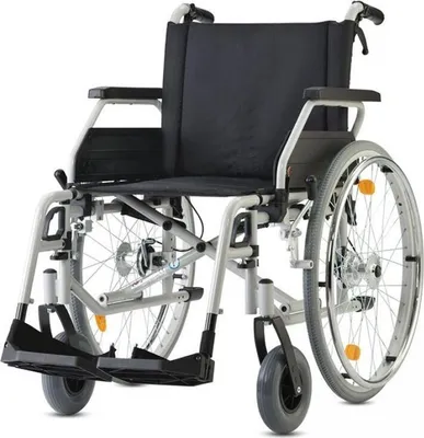 A studio shot of a wheelchair against a white background.