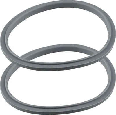 Two gray sealing rings are stacked on a white background.