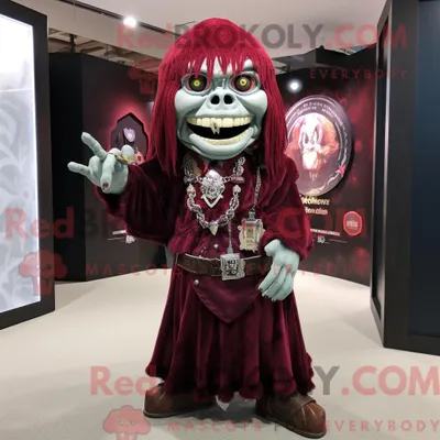 Imagen del producto de Personaje REDBROKOLY mascota de un no-muerto granate vestido con una falda acampanada y llaveros