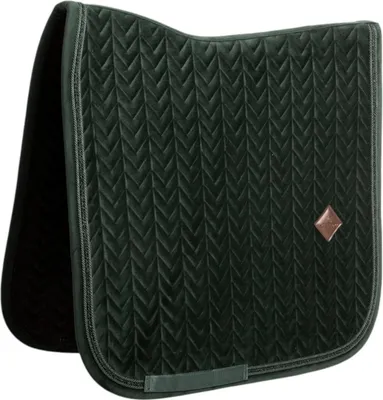 A close-up studio shot of a dark green saddle pad.