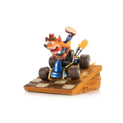 A statue of Crash Bandicoot in a go-kart on a ramp.