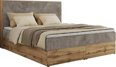 A bed with pillows and blankets on a white background.