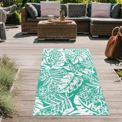 Produktbild von Wetterfester Outdoor-Teppich mit tropischem Flair in petrol Größe - 90 x 150 cm