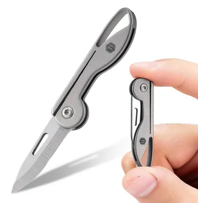 Immagine prodotto di Coltello tascabile Titan Mini EDC, pieghevole, lama affilata come una rasoio, colore argento, leggero, portachiavi, ideale per campeggio, escursioni e attività all'aperto