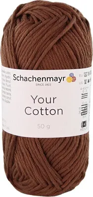 A ball of brown yarn with a label.