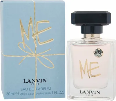 A perfume bottle and its packaging are displayed side-by-side against a white background.