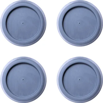 Four gray circular vibration dampeners are arranged in a 2x2 grid on a white background.