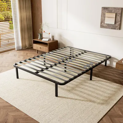 A metal bed frame with wooden slats is shown on a rug in a bedroom setting.