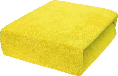 A folded yellow fitted sheet is shown on a white background.