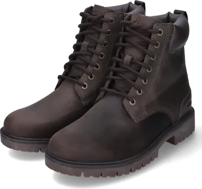 A pair of brown leather boots.