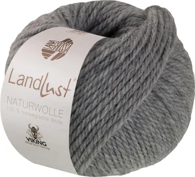 A ball of gray yarn with a label.