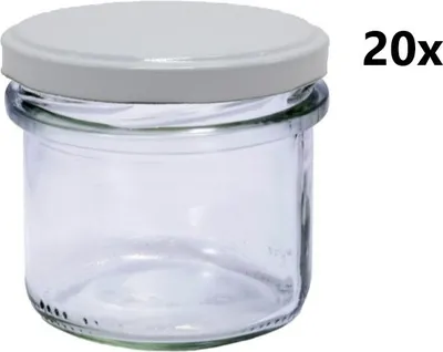 A clear glass jar with a white lid, shown against a white background. The text '20x' is visible on the right side of the image.
