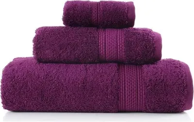 Three stacked towels of varying sizes.