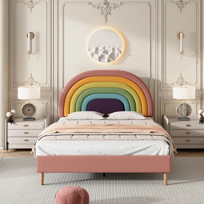 A bedroom scene featuring a pink bed with a rainbow-shaped headboard.