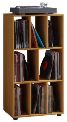 A record player sits on top of a wooden shelf unit filled with vinyl records.