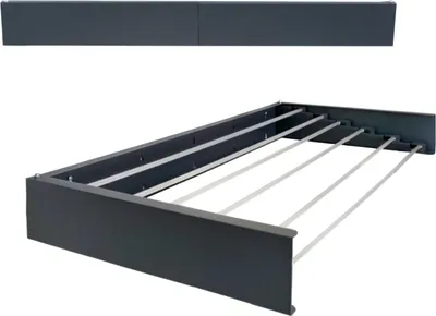 A wall-mounted drying rack is shown against a white background.