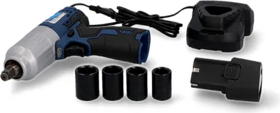 A cordless impact wrench kit with accessories, charger, and battery, laid out on a white background.