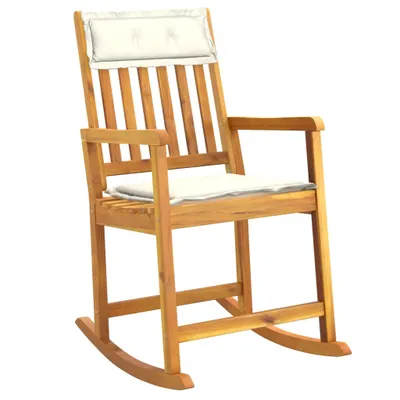 A wooden rocking chair with white cushions, presented against a white background.
