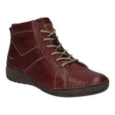 A single red leather boot is shown against a white background.
