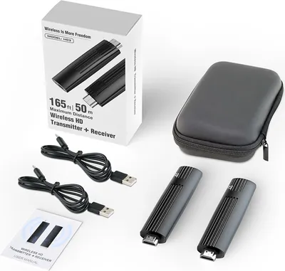 A product shot of a wireless HDMI extender kit, including the packaging, two transmitter/receiver units, cables, a carrying case, and a user manual.