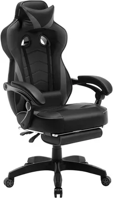 A black and gray gaming chair with a headrest and footrest is shown against a white background.