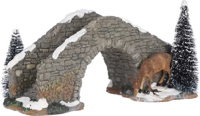 A miniature stone bridge with snow and a deer, set against a white background.