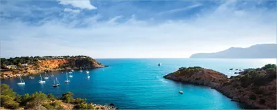Produktbild von Wallario selbstklebendes Poster - Ibiza - Blick von einer Bucht aufs Meer, Größe: 50 x 125 cm