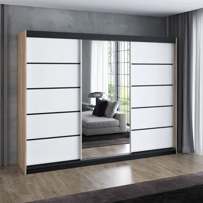 A modern wardrobe with mirrored doors.