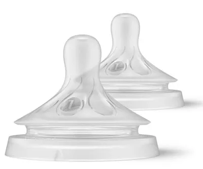 Two clear baby bottle nipples are shown against a white background.